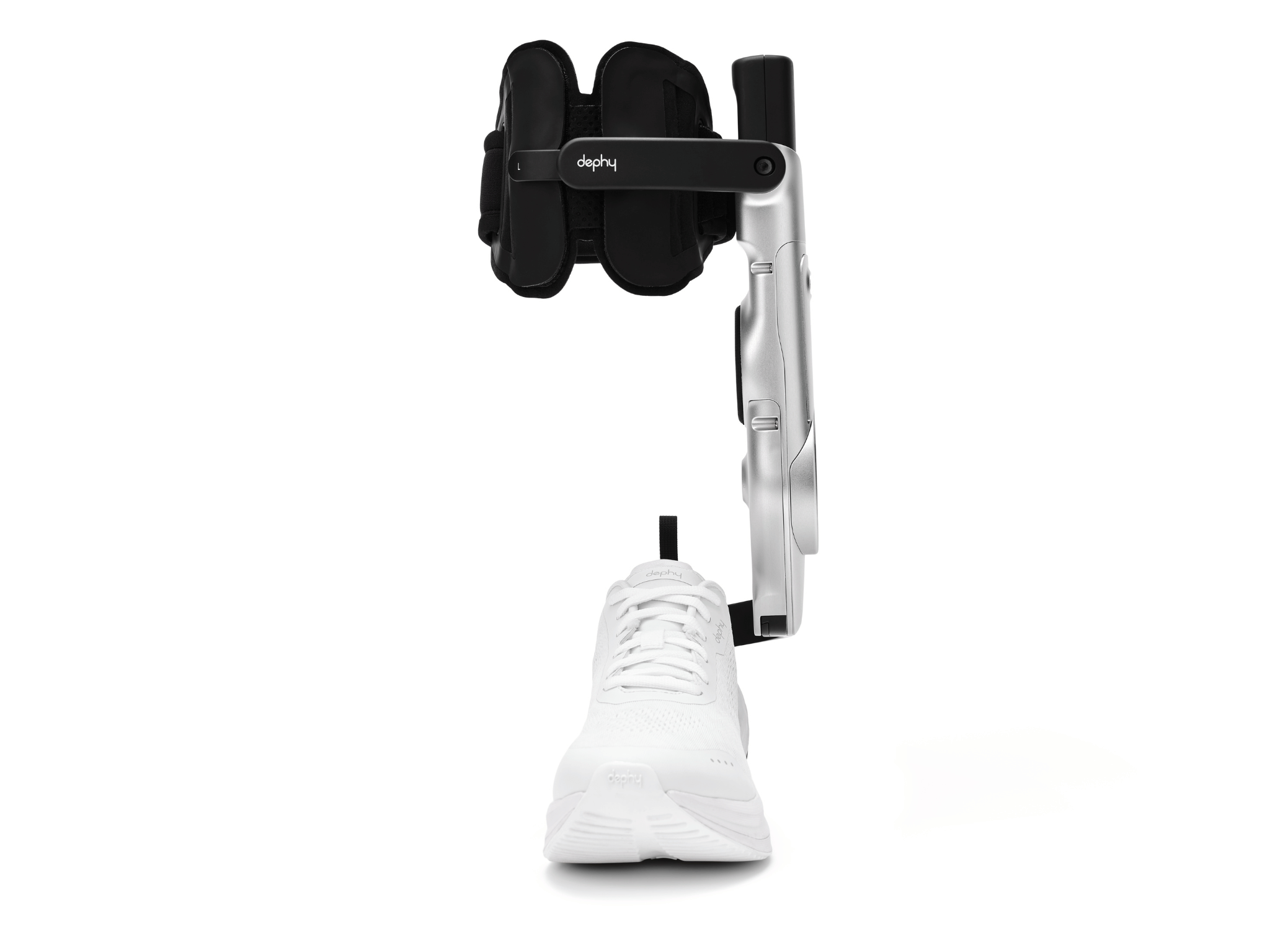 White sneaker being measured with a black and Sidekick on a white background